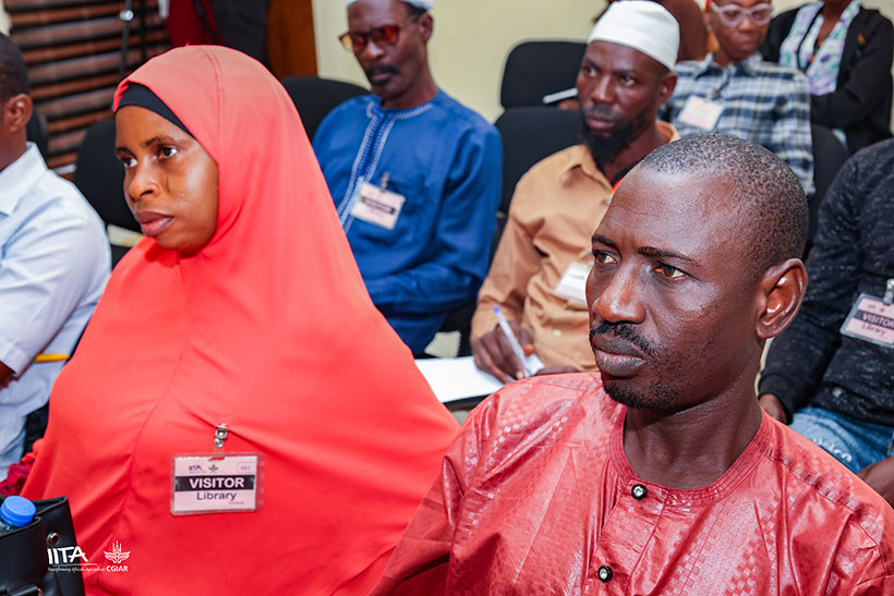 Participants listening to farming tips from experts.