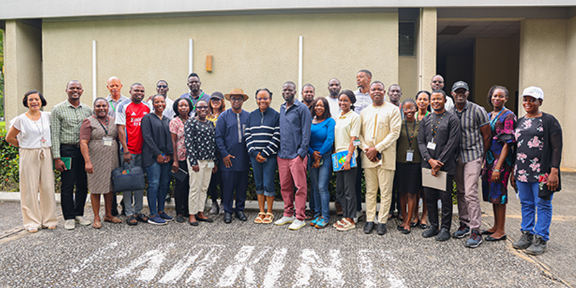 Dr Agre Paterne with participants of the Knowledge Café