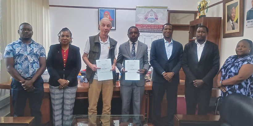 IITA Banana Breeder, Professor Rony Swennen with some IITA staff and the NM-AIST representatives.