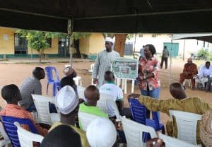 Picture of Dr Beatrice Aighewi of YIIFSWA explains about the pests  and diseases affecting yam.