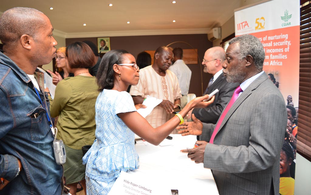 Picture of IITA scientists granting interviews to the press.