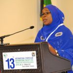 Picture of Rukia Liumba, a farmer and small-scale cassava processor speaking at opening plenary.