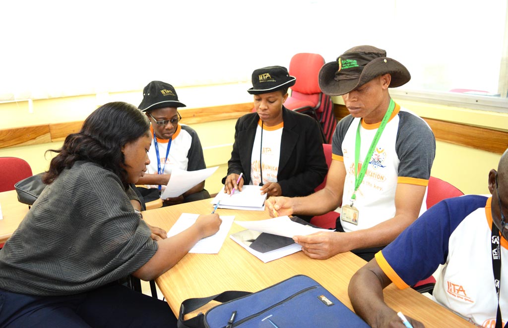 Course participants in a group exercise