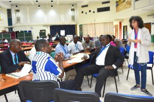 Picture of Monica Mezzalama of CIMMYT (right) with one of the working groups during the MLN meeting in IITA.