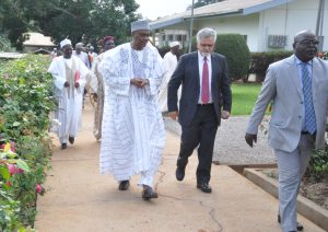 Picture of Rachid leading the delegates to the various exhibition stands.