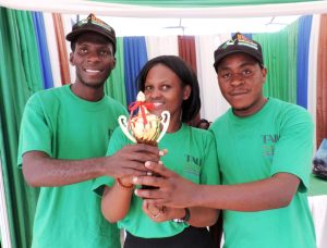 Picture of TYA representatives with the trophy they won at the national Agricultural show.