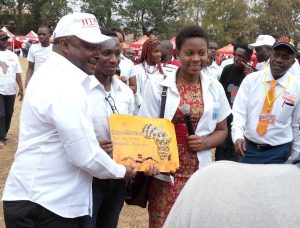 Picture of DG Sanginga presenting awards to deserving staff