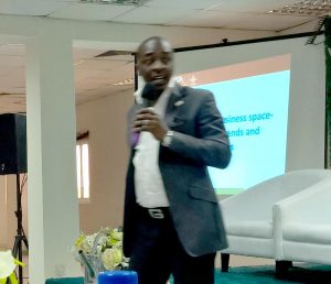 Picture of Layi Olatunji speaks on behalf of BIP at the agribusiness workshop.
