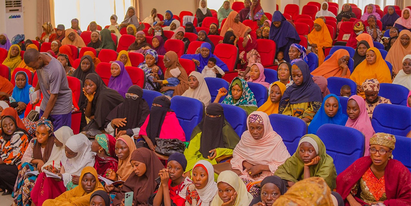 A group of participants engaged in the women’s training session.