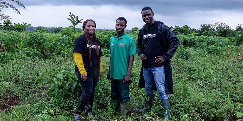 Samuel Taiwo Peters flanked by AFR1OO donor representatives, Eunice Adofo Boanya (L) and Samuel Appiah Ofori (R) at Olokemeji Forest Reserve (OFR).