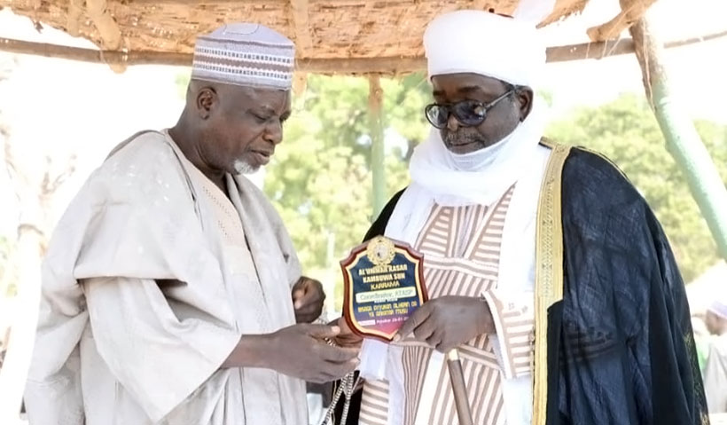 ATASP-1 Kebbi Sokoto zonal program coordinator receiving his award from Alhaji Haruna Jada.