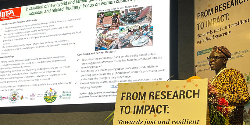 Abolore Bello pitching a poster on the varietal effect on processing productivity and related drudgery of women cassava processors. Gender and Agrifood Conference in New Delhi, India (Photo Credit: Teeken Bela)