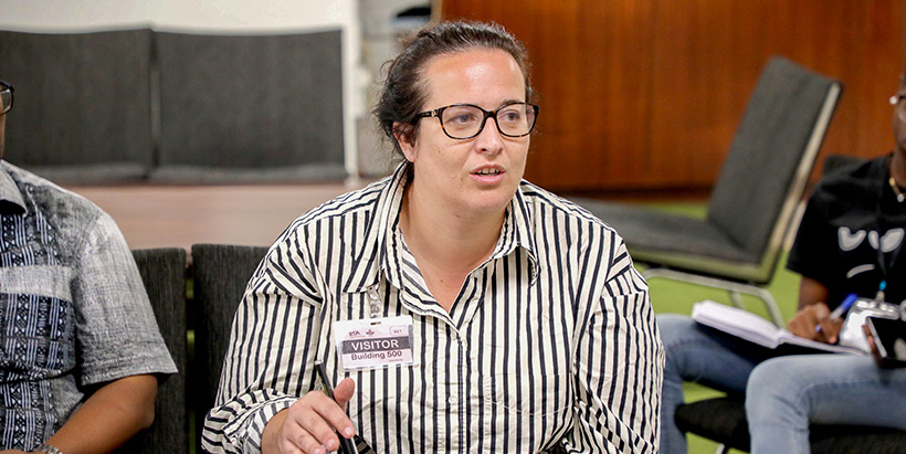 Nova Genetic Research Manager Florine Poiroux highlighting the objective of the visit.