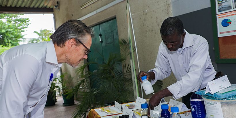Zandstra observing the Aflasafe technology for producing safe food developed by IITA
