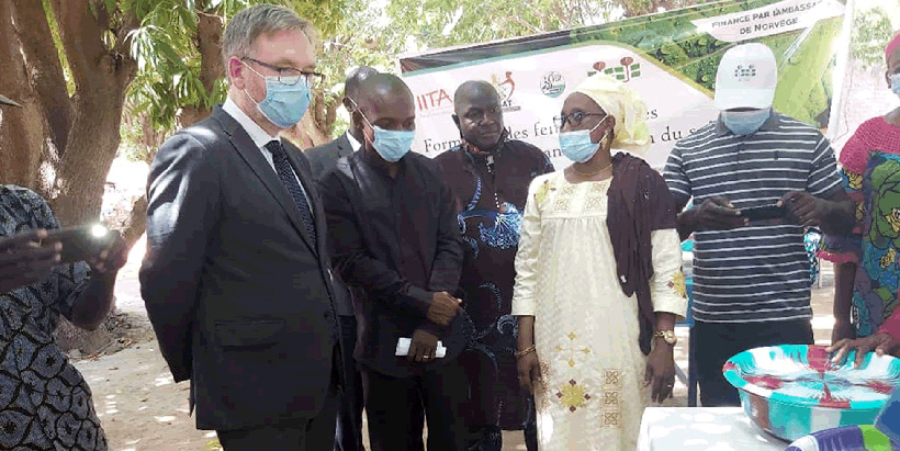 IER food technologist highlights the soybean transformation training to His Excellency Vegar Brynildsen.
