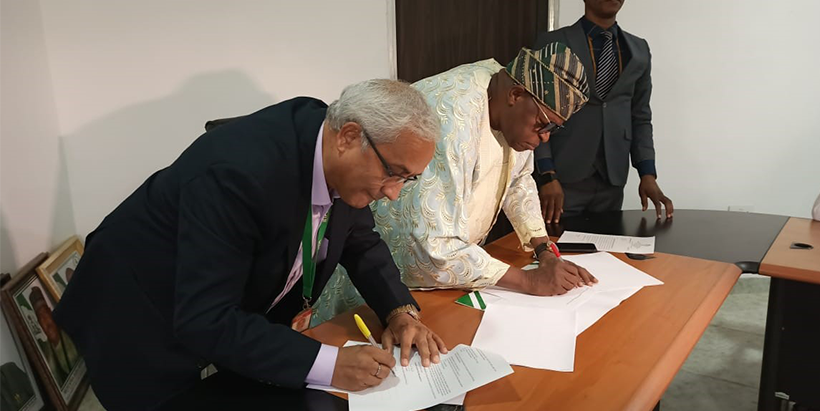  Chief of Party (NIAA), Prakash Kant Silwal and the Director-General (NASC) during the signing.