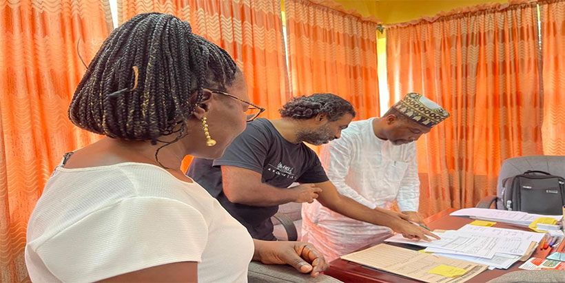 Endorsement of the market segments and target product profile documents by the Executive Director, NIHORT, Dr M. Lawal Attanda witnessed by Dr Vishnuvardhan Reddy Banda (ABI-IITA) and Dr Delphine Amah (IITA).