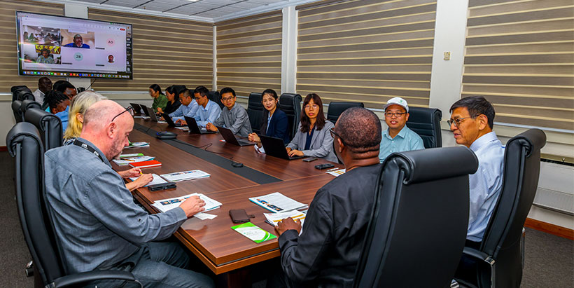 The China Agriculture University delegation and the IITA team discussing collaboration opportunities.