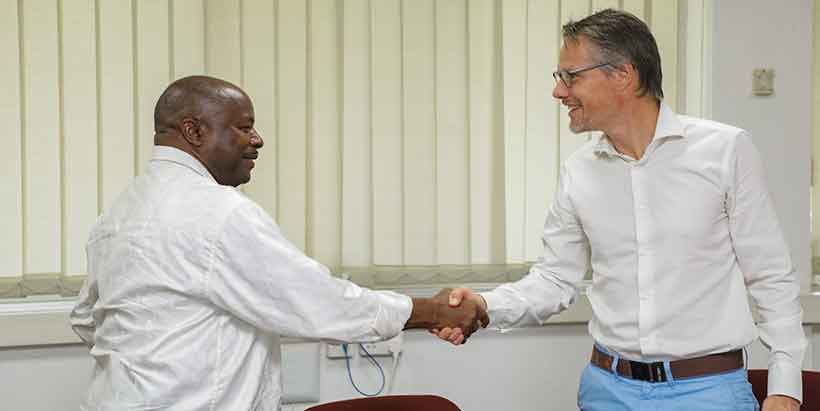 Dr Sanginga welcoming Andre Zandstra to IITA Boardroom 1