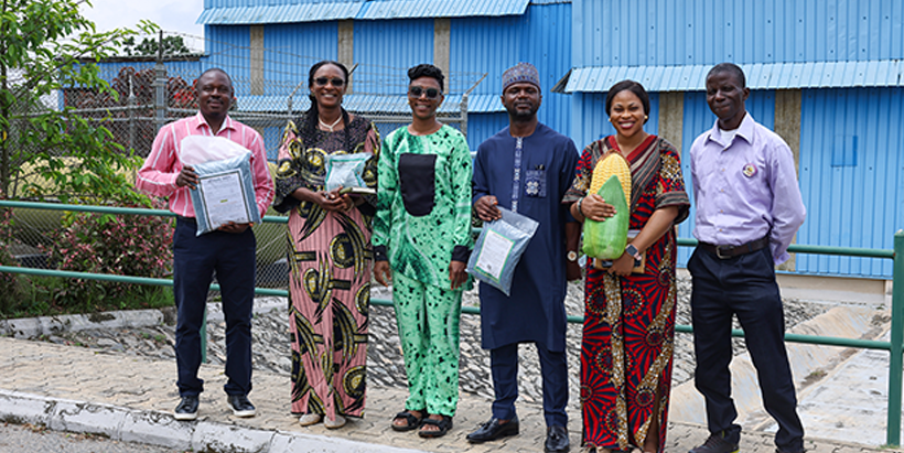 Heifer International delegates with Dr Titilayo Falade, IITA Food Safety Scientist, at the Aflasafe building.