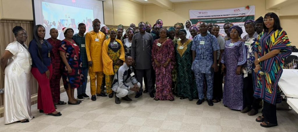 A vibrant group photograph featuring the project team, beneficiaries, Project Lead, GAIN desk officers, and participants from Oyo and Benue (joined virtually).