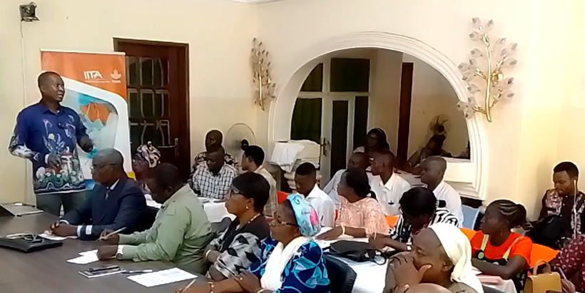 Agri-multiplier structures led by women, brandishing their certificate of participation.