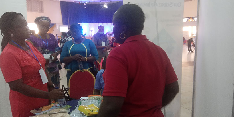Co-create the future-p01.jpg: Fair participants at the IITA stand.