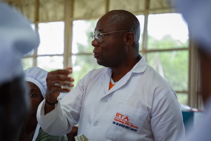 Gregory Nwaoliwe and participants at practical session of the training.