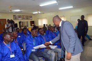 HYPREP Project Coordinator shaking hands with the participants.