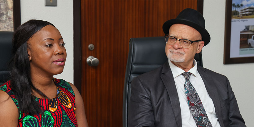 IITA DDG P4D Kenton Dashiell discussing with Deputy Chief of the Political and Economic Section, Kenise Hill after the meeting.