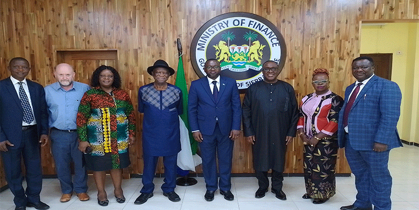 IITA Director General and CGIAR Regional Director for Continental Africa Dr Simeon Ehui, Sierra Leone Minister of Finance Honorable Sheku Ahmed Fantamadi Bangura with the IITA team, and a member of the Minister's cabinet.