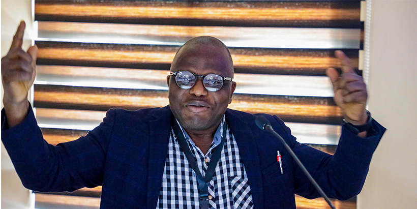 IITA-GRC Seedbank Manager Dr Olaniyi Oyatomi demonstrating the importance of FIGS in genetic resources management.