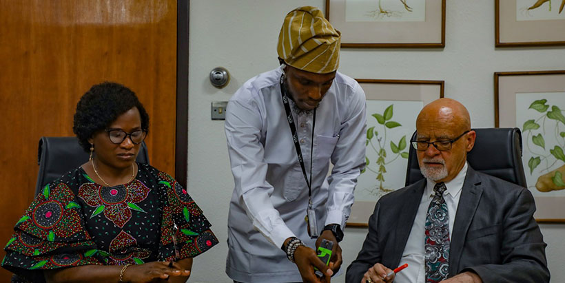 IITA and FUTA representatives discussing the partnership formalization.