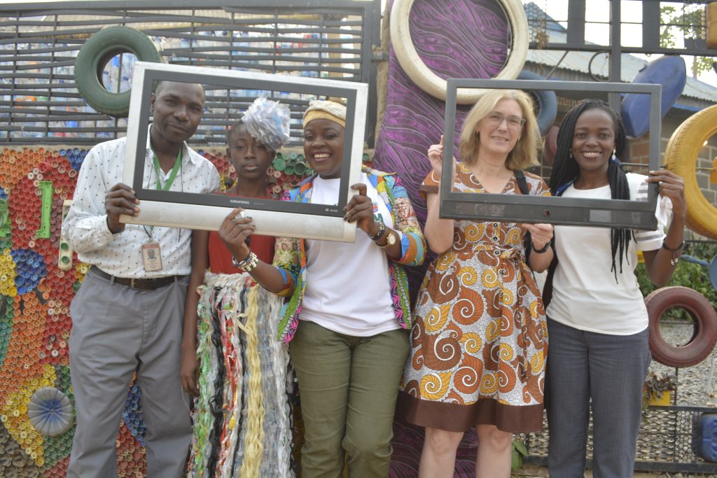 The Waste Museum and IITA representatives posing with TV scraps.