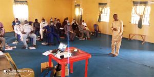 Tukur Abdulazeez of ICRISAT training participants on GAP in Sorghum at Kwaya Kusar, Borno State.