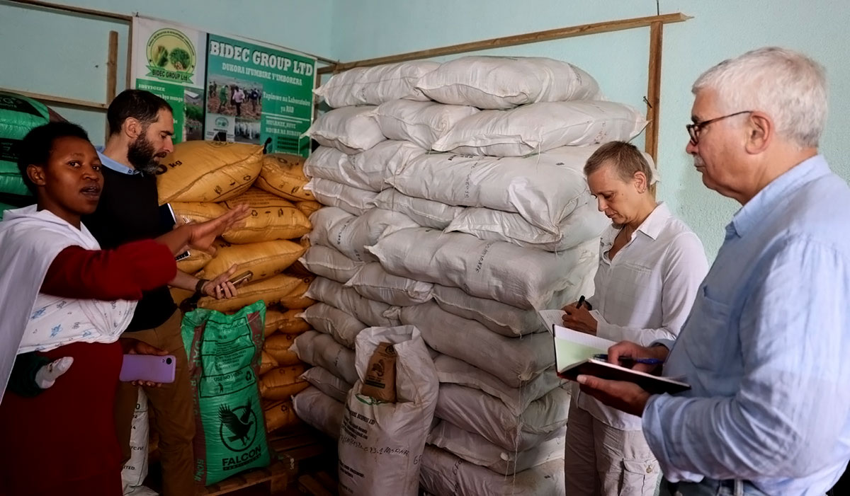Josette, elucidating her partnership with seed companies to reach farmers with improved seed and other agricultural inputs.