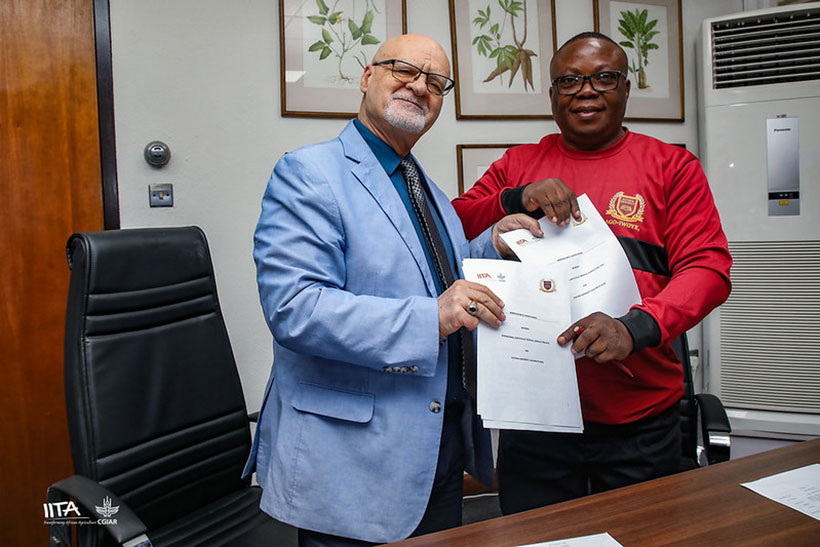 IITA DDG Partnerships for Delivery, Kenton Dashiell and Aletheia University Vice Chancellor Prof. Amos Onasanya exchanging MoU.