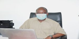 Victor Manyong in his office during the interview.