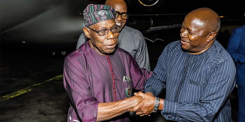 Left: IITA DG Nteranya Sanginga (right) welcoming Goodwill Ambassador Olusegun Obasanjo. Right: Talking to the press after the meeting