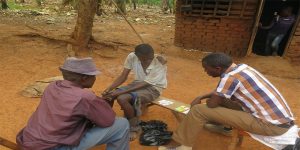 Wodada Wilberforce from IITA interviewing farmers for a survey
