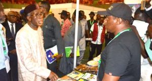 Picture of Minister of Agriculture, Chief Audu Ogbeh, visiting the IITA stand