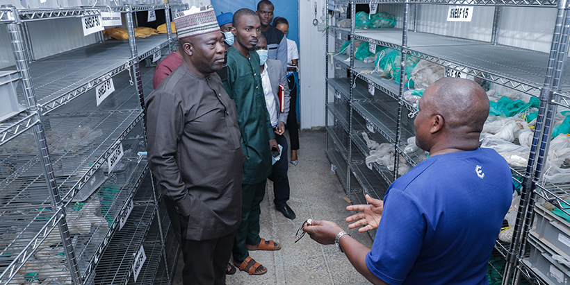 Dr Ajibola and team visiting storage facilities at the IITA Genetic Resources Center.