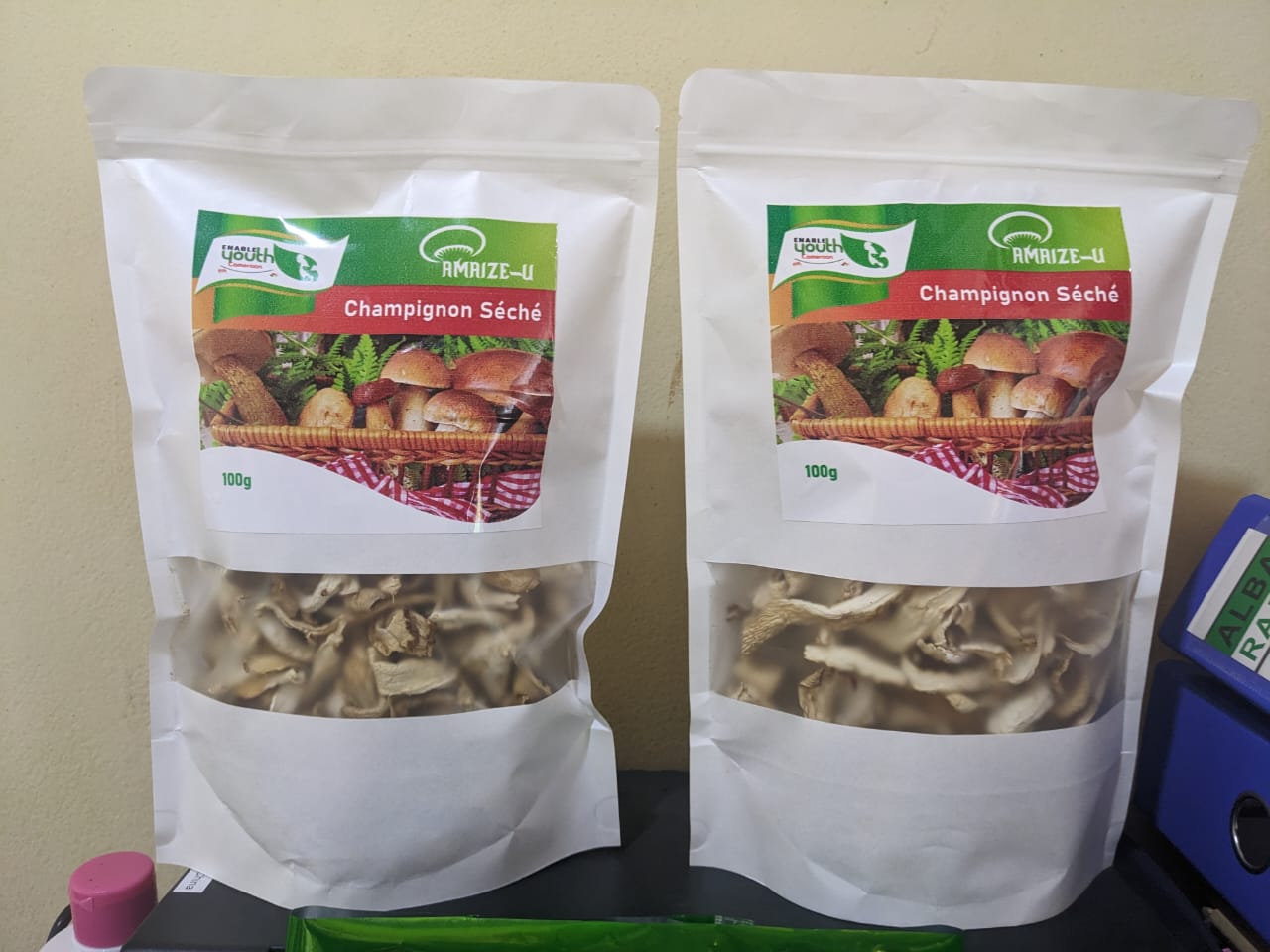 Packaged and branded mushrooms.