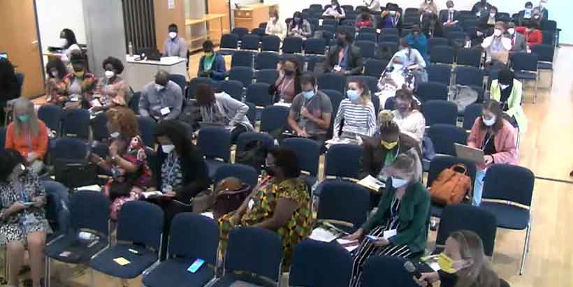 Participants engaging panelists with questions.