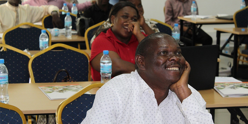 Participants excitedly following a presentation during the training. Photo: IITA/Hadi Rashid