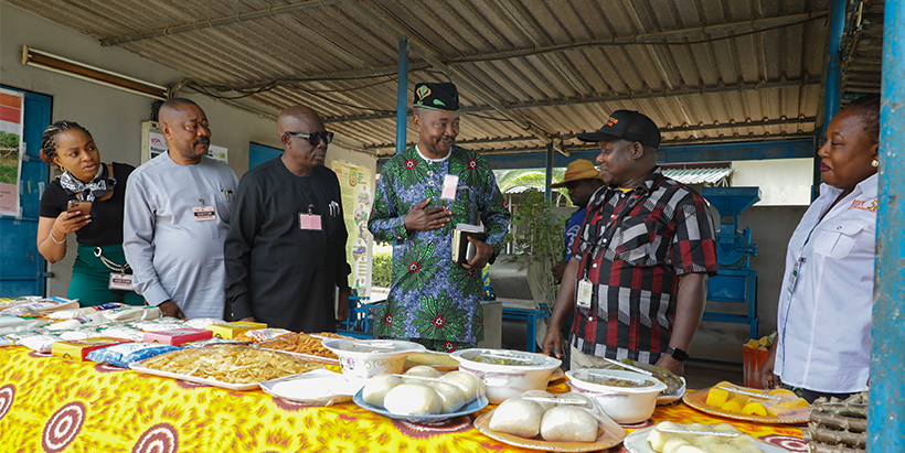Peter Iluebbey, IITA’s International Trials Manager, Cassava Breeding, enlightening the team from PAP on cassava’s vast varieties, value chain, by-products, and nutritional and health benefits