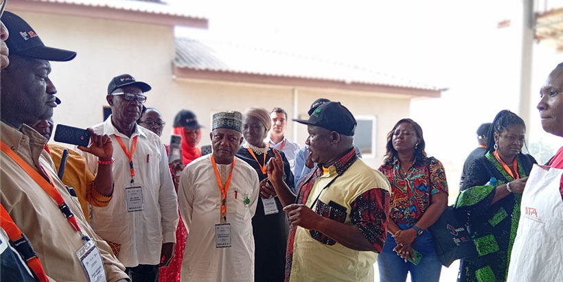 Peter Iluebbey welcoming the visitors into the IITA cassava factory at IITA, Ibadan.