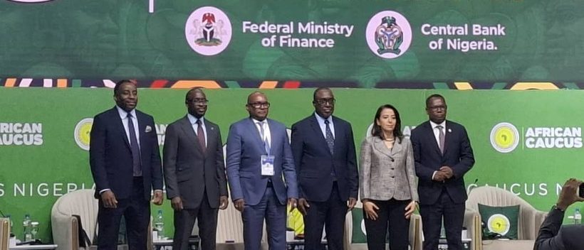 Dr. Simeon Ehui with the panelists at the 2024 African Caucus Meeting in Abuja, Nigeria.