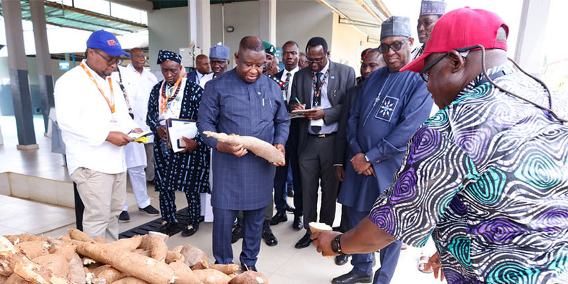 President Bio and other participants, on a tour of IITA-CGIAR Cassava Processing Center.
