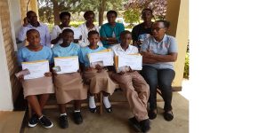 Students displaying their awardcertificates. 